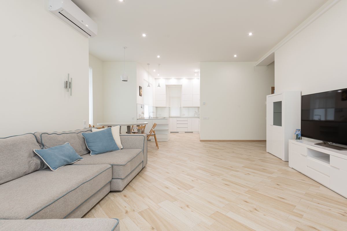 Wall-mounted air conditioning unit in a bright interior